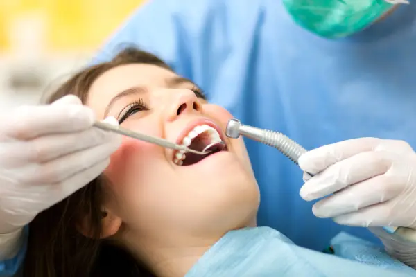 happy woman in a dentist office