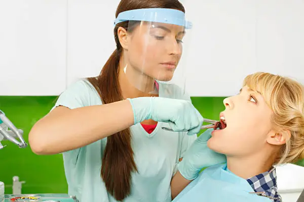 A lady at the dentist